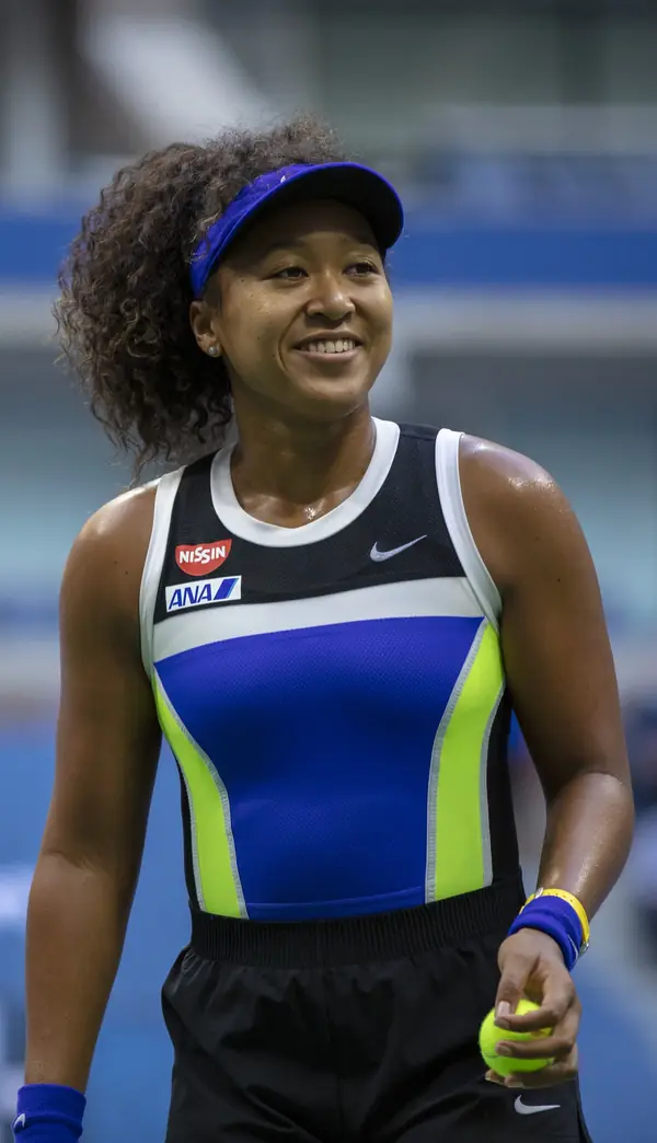 Naomi Osaka smiling during her 2020 US Open final, Arthur Ashe Stadium, September 12, 2020 (cropped; two years after the 2018 final)