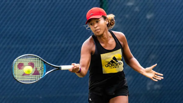 Naomi Osaka hitting a forehand on grass, June 10, 2018 (not the US Open)