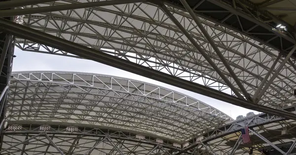 The Arthur Ashe Stadium roof closing, August 31, 2018 (cropped; a week before the final)