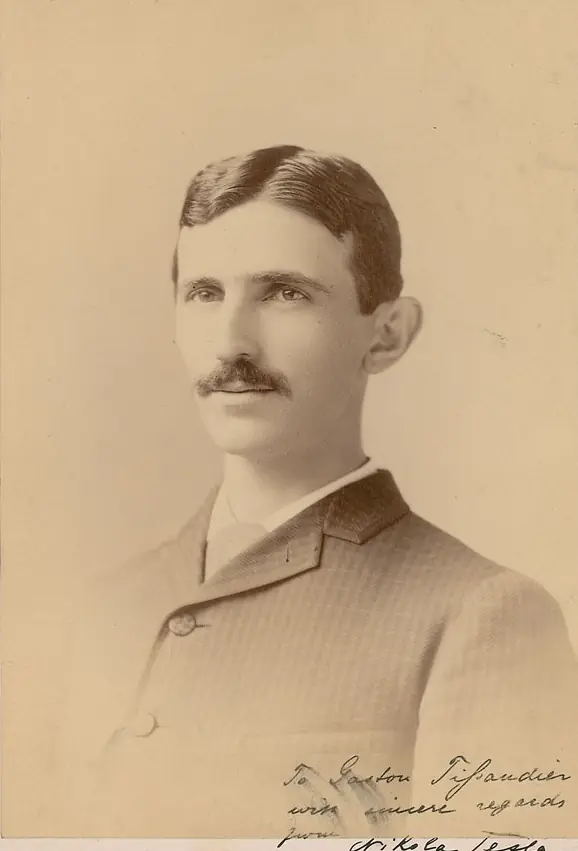 Nikola Tesla, cabinet card by Napoleon Sarony, about 1885, signed by Tesla to Gaston Tissandier