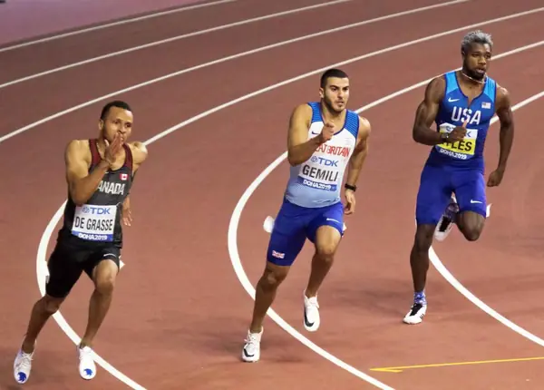 Noah Lyles (right) with Adam Gemili and Andre De Grasse in the 200 m final at the World Championships, Doha, October 1, 2019 (not the Paris 200 m)