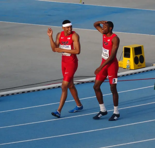 Noah Lyles (hand on head) with a US teammate after the 4x100 m relay final, IAAF World U20 Championships, Bydgoszcz, Poland, July 23, 2016