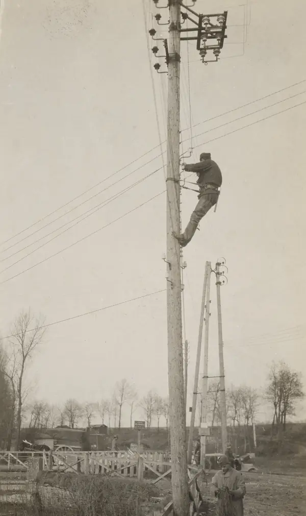 Second Field Service Signal Battalion linemen stringing telephone wires to the front, Menil-la-Tour, France, February 7, 1918 (another unit)