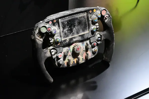 His burned steering wheel, shown with the car at The Formula 1 Exhibition, London, February 20, 2025