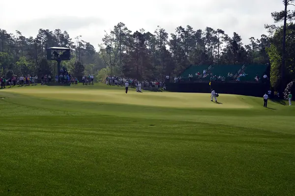 A green at Augusta National in Masters week, April 8, 2015 (other players, not McIlroy)