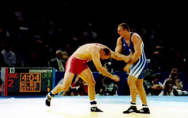 Another Greco-Roman gold-medal match in the Sydney 2000 Olympic wrestling hall, September 26, 2000, the day before Gardner’s final (neither wrestler is Gardner or Karelin)