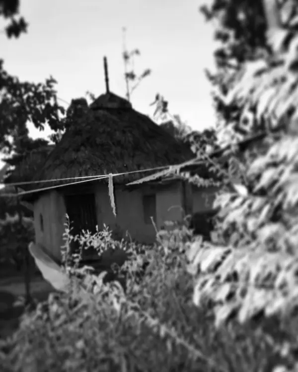 A traditional thatched Kalenjin house in Kenya, in black and white, July 10, 2021 (not Sawe’s home)