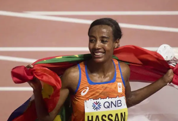 Sifan Hassan celebrates her 10,000-meter world title, Doha, September 28, 2019