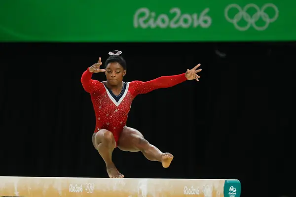 Simone Biles on the beam in the same Rio 2016 final, August 15, 2016 (not Tokyo)
