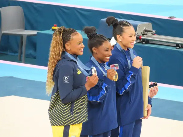 The all-around podium at the Paris 2024 Olympics, August 1, 2024: Rebeca Andrade (silver), Simone Biles (gold) and Sunisa Lee (bronze)