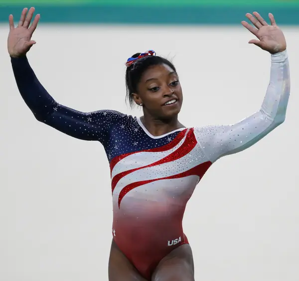 Simone Biles at the team final of the Rio 2016 Olympics, August 9, 2016 (cropped; not Tokyo)