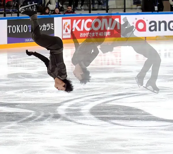 Adam Siao Him Fa in his backflip at the 2024 Grand Prix de France, Angers, November 2, 2024, a multiple-exposure image (not Surya Bonaly)
