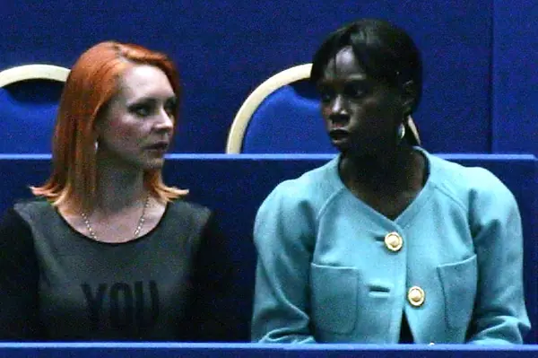 Marina Anisina (left) and Surya Bonaly (right) as guests in the stands at the 2012 World Figure Skating Championships, Nice, March 27, 2012 (not the 1998 Olympics)