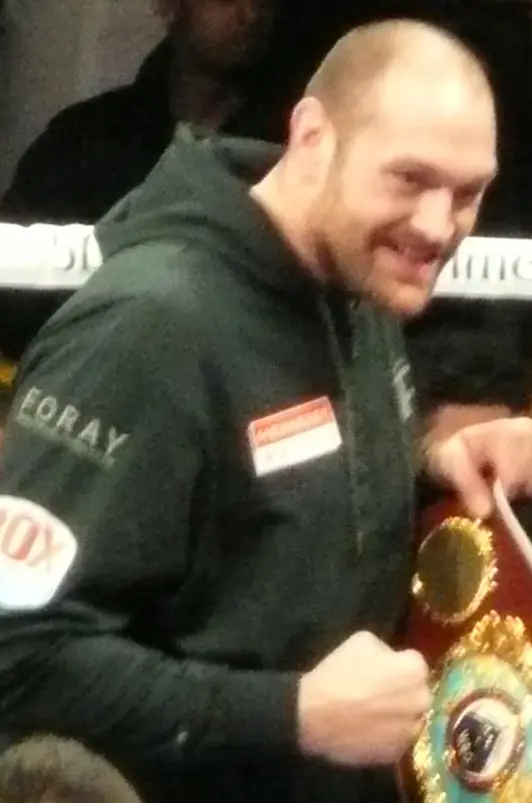 Tyson Fury with title belts at the Copper Box Arena, London, April 30, 2016