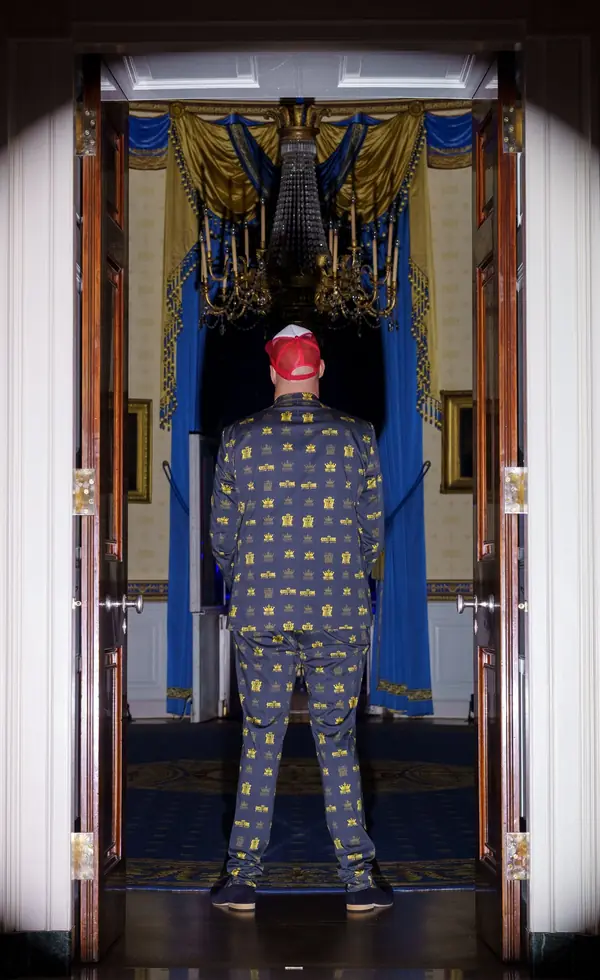 Tyson Fury, seen from behind, in a doorway at the White House, June 14, 2026 (cropped)