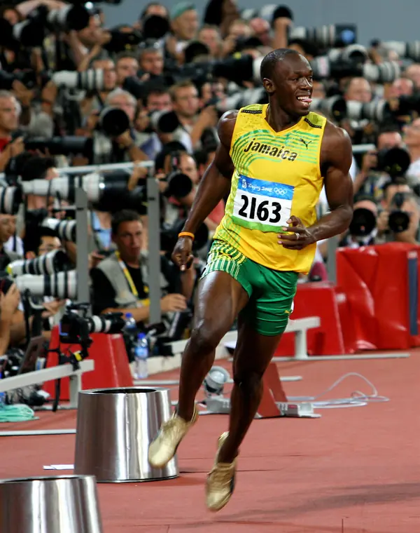 Usain Bolt and his gold spikes after the 2008 Olympic 100 meters final, Beijing