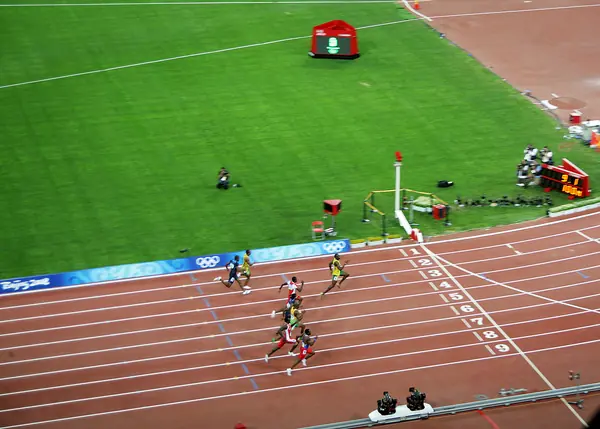 The 2008 Olympic 100 meters final at the line, seen from the stands, Beijing, August 16, 2008